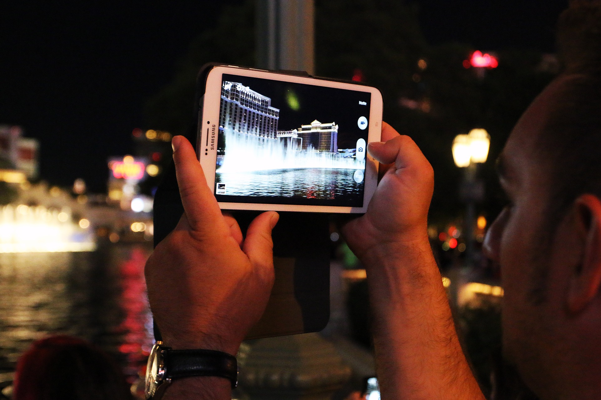 Person taking photos of a building